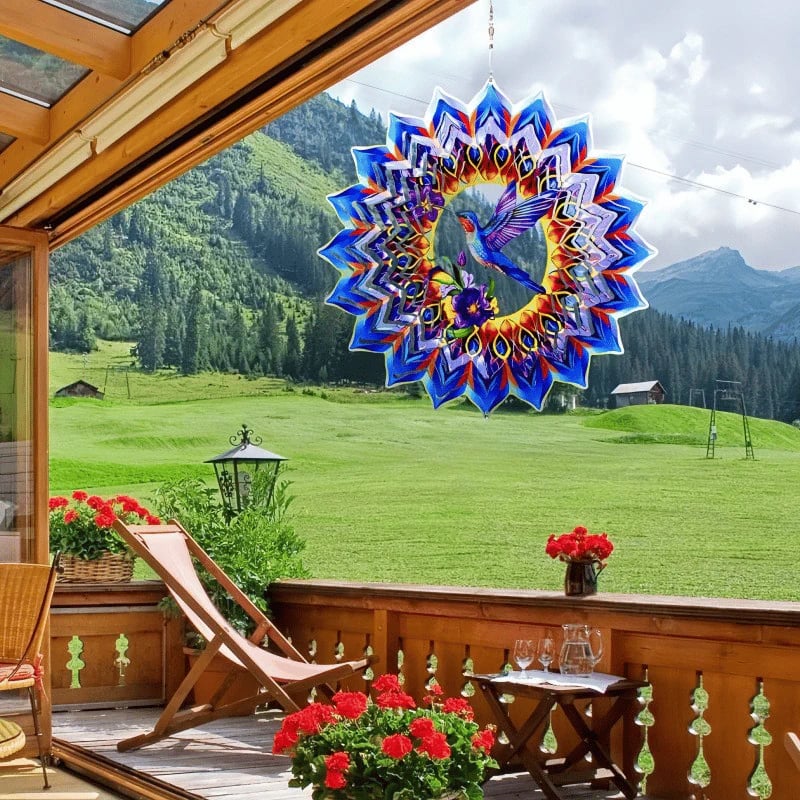 Bright blue and gold hummingbird mandala wind spinner hanging outside
