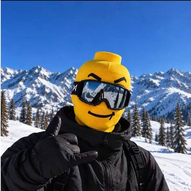 Yellow novelty ski mask with a mischievous smirk
